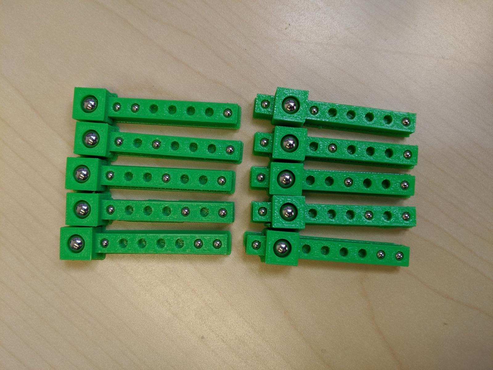 3D-printed bars with metal beads in unique, CT-recognizable patterns